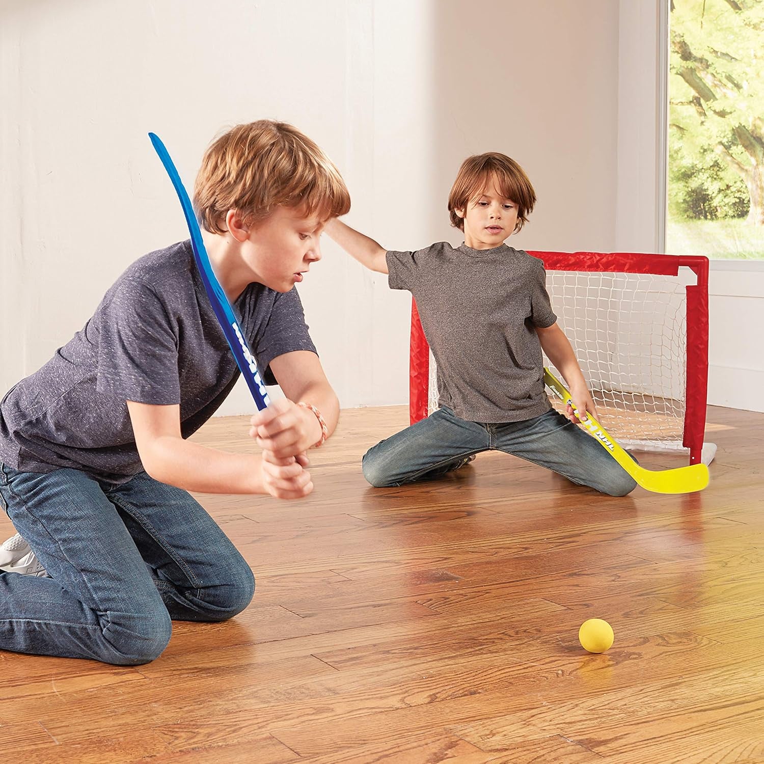 - NHL Kids Folding Hockey Goals Set - (2) Street Hockey & Knee Hockey Goals - (2) Adjustable Youth Hockey Sticks, (2) Knee Hockey Sticks, (2) Mini Hockey Balls + (1) Street Hockey Ball